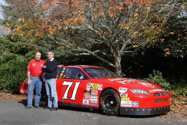 The image shows Ken Vincent (left) with Speedshow organiser Keith Sharp and the world�s fastest NASCAR which is on show at Speedshow �09 in September this year